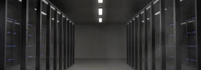IT engineers troubleshooting a server room outage