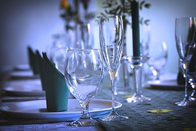 A formal corporate annual banquet set up in a decorated ballroom.